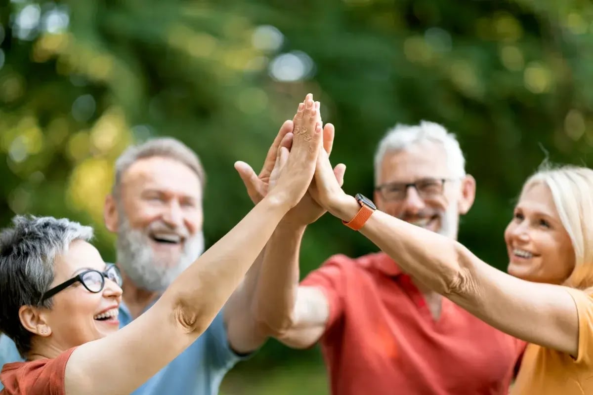 Elderly group high five