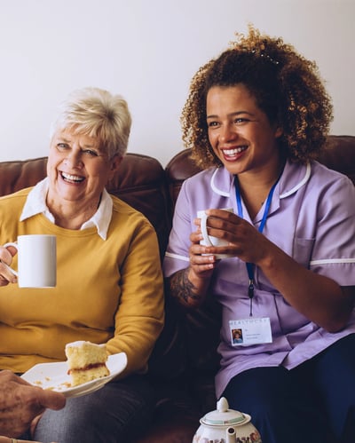 Staff sitting with resident